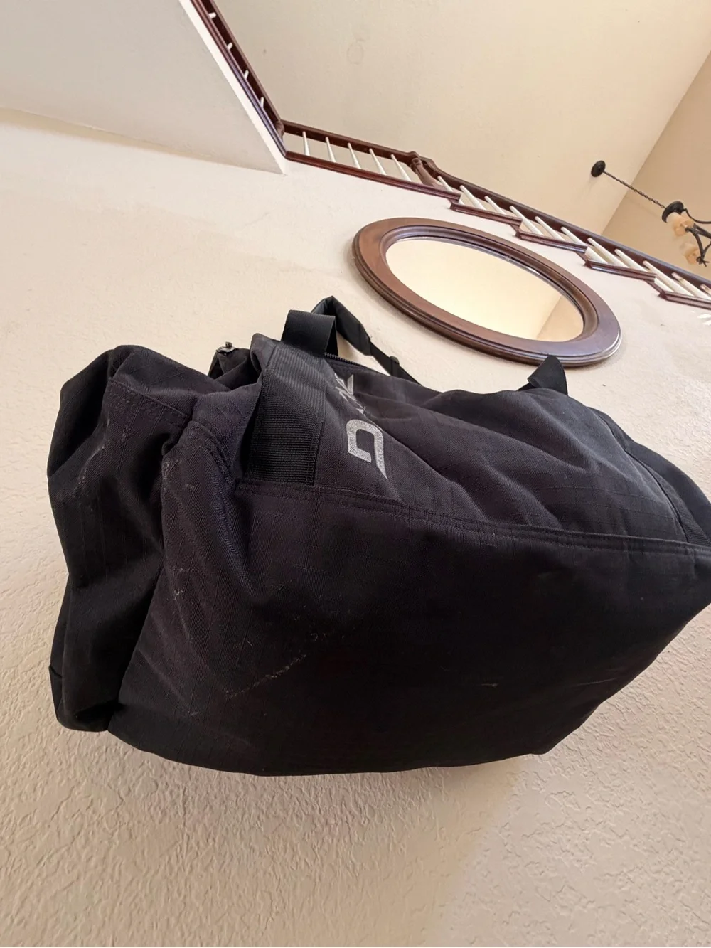 DAKINE Black Men’s Duffel with White Logo